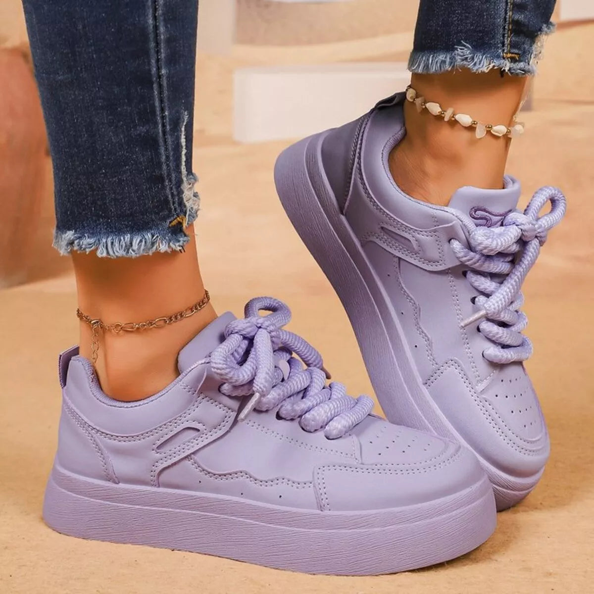 Rafaela sneakers i läderlook, lila