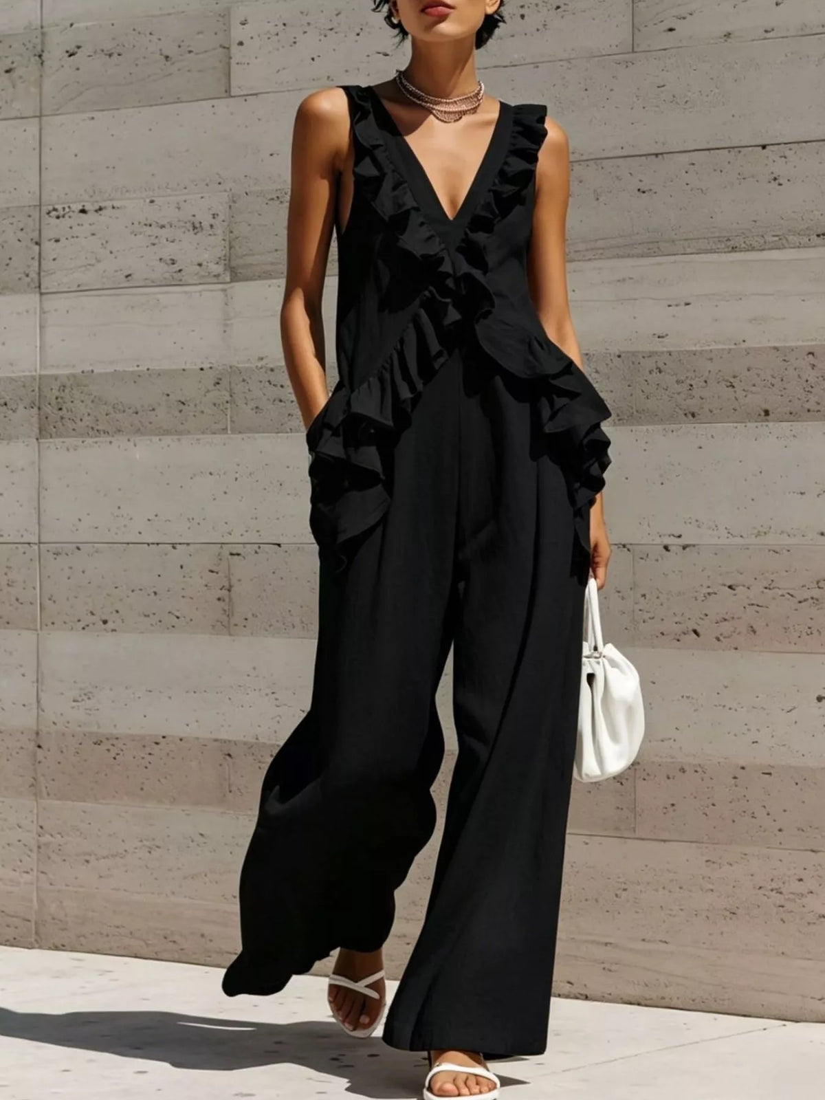 Calliope jumpsuit med volanger, svart