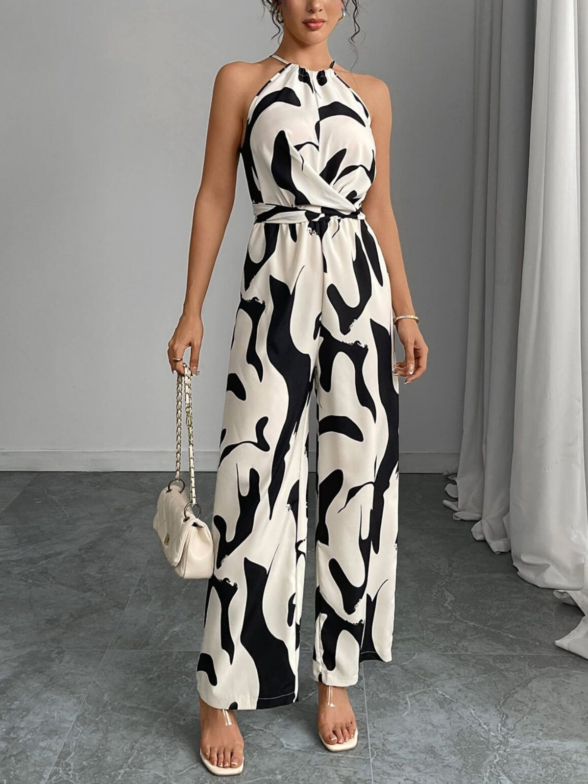 Damaris jumpsuit med abstrakt tryck, svart
