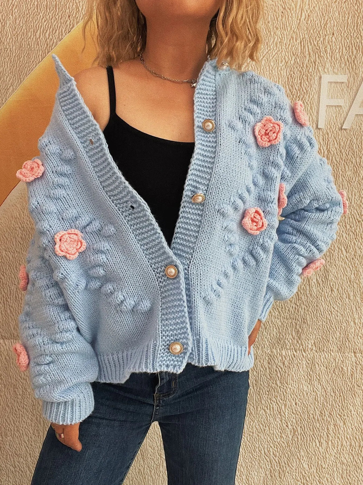 Ina cardigan med blomdetaljer
