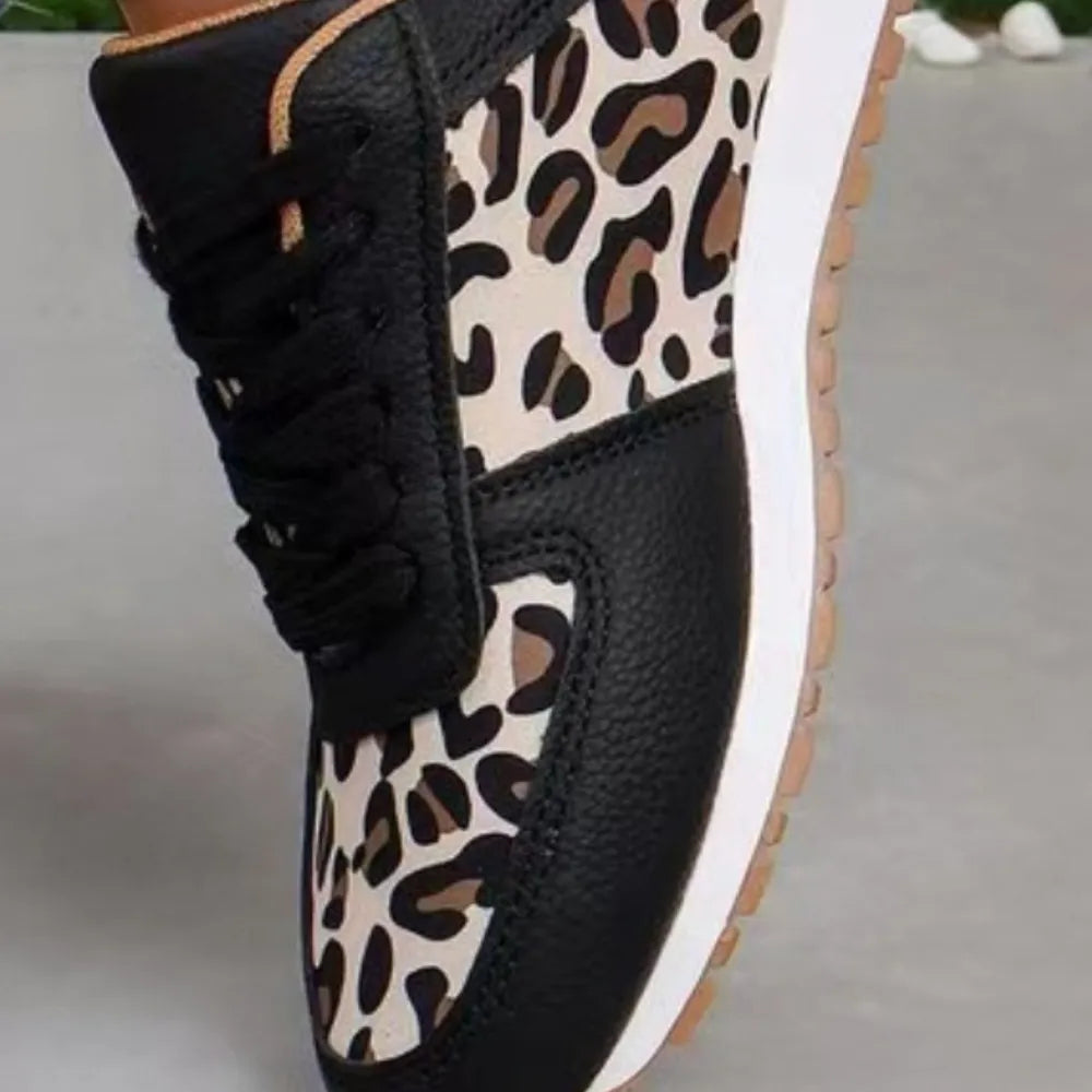 Aster sneakers i läderlook