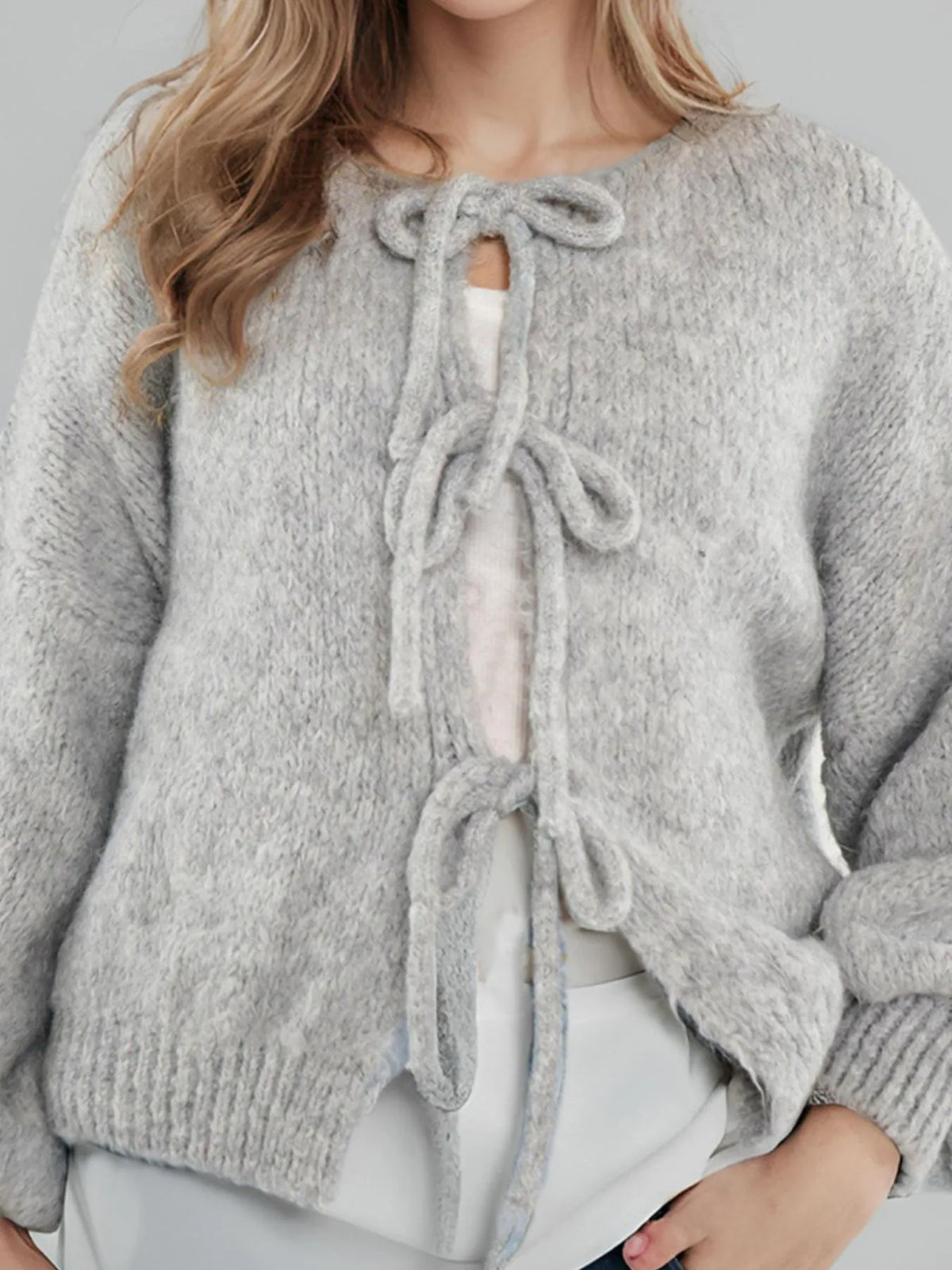 Kinga cardigan med rosett