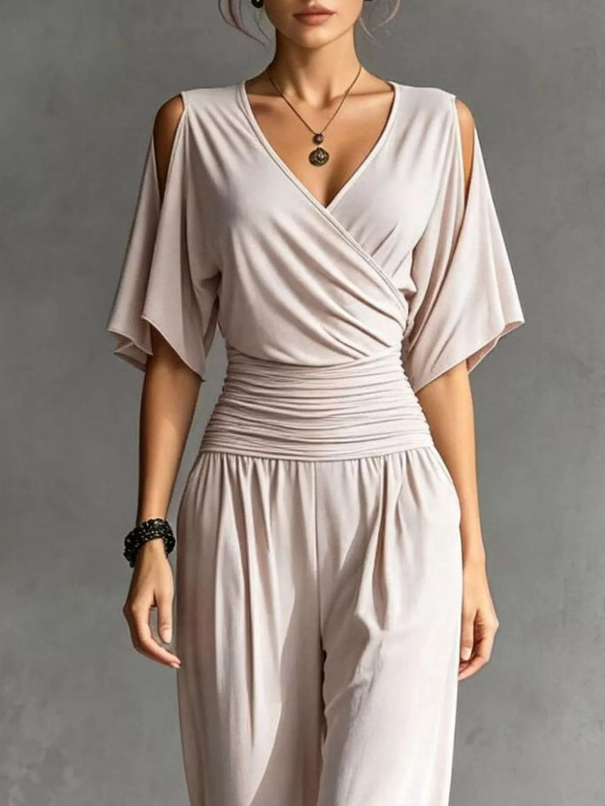 Angela jumpsuit med markerad midja