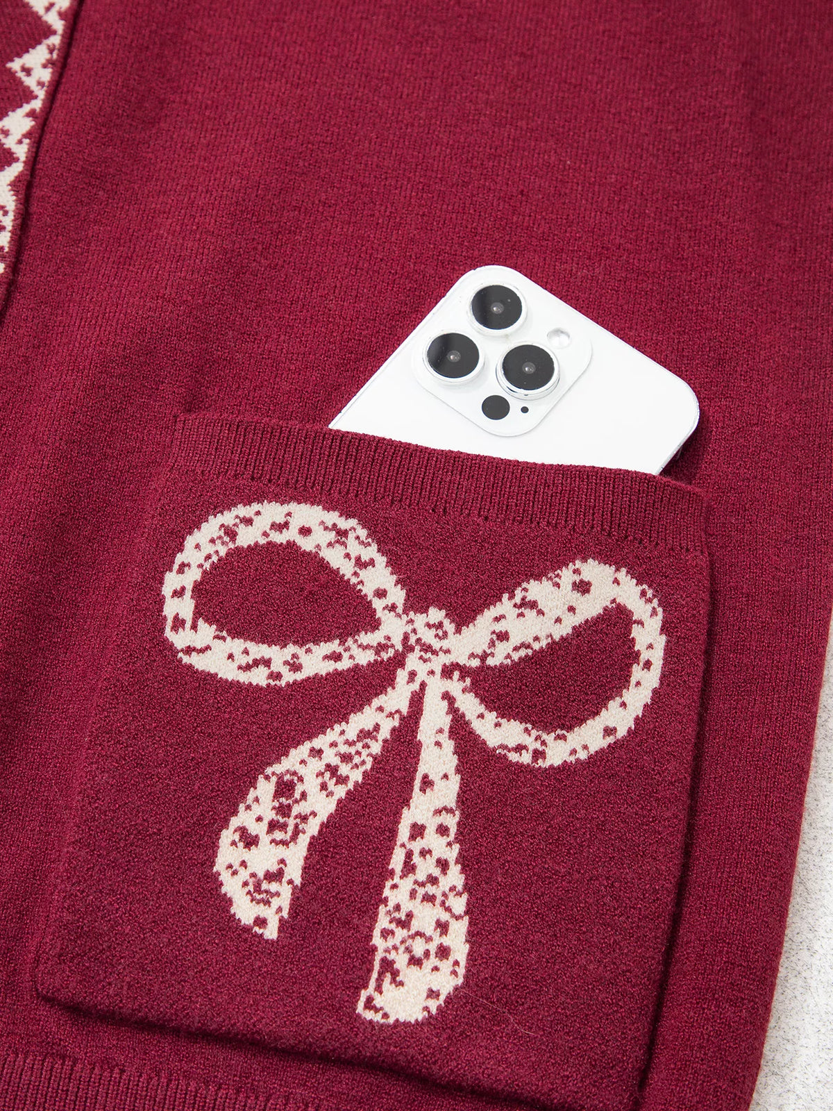 Mona cardigan med rosett