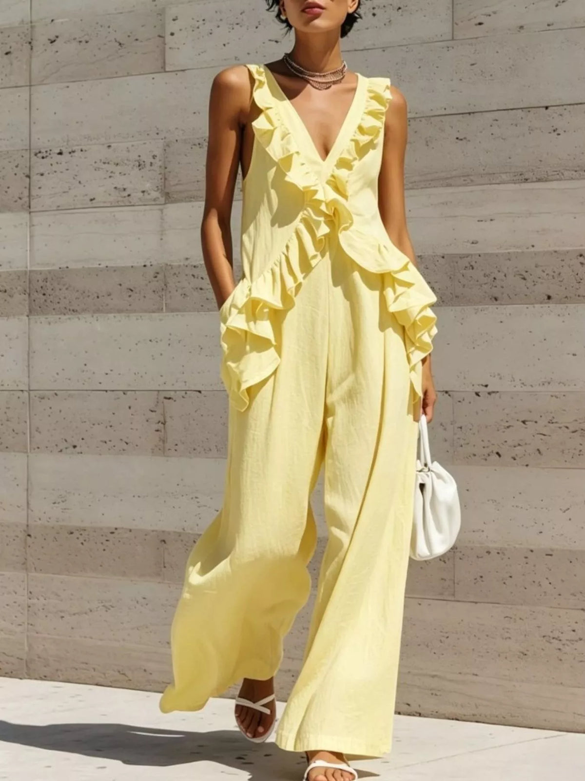 Calliope jumpsuit med volanger, gul