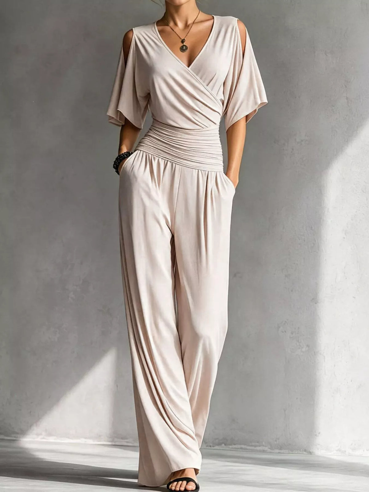 Angela jumpsuit med markerad midja, aprikos