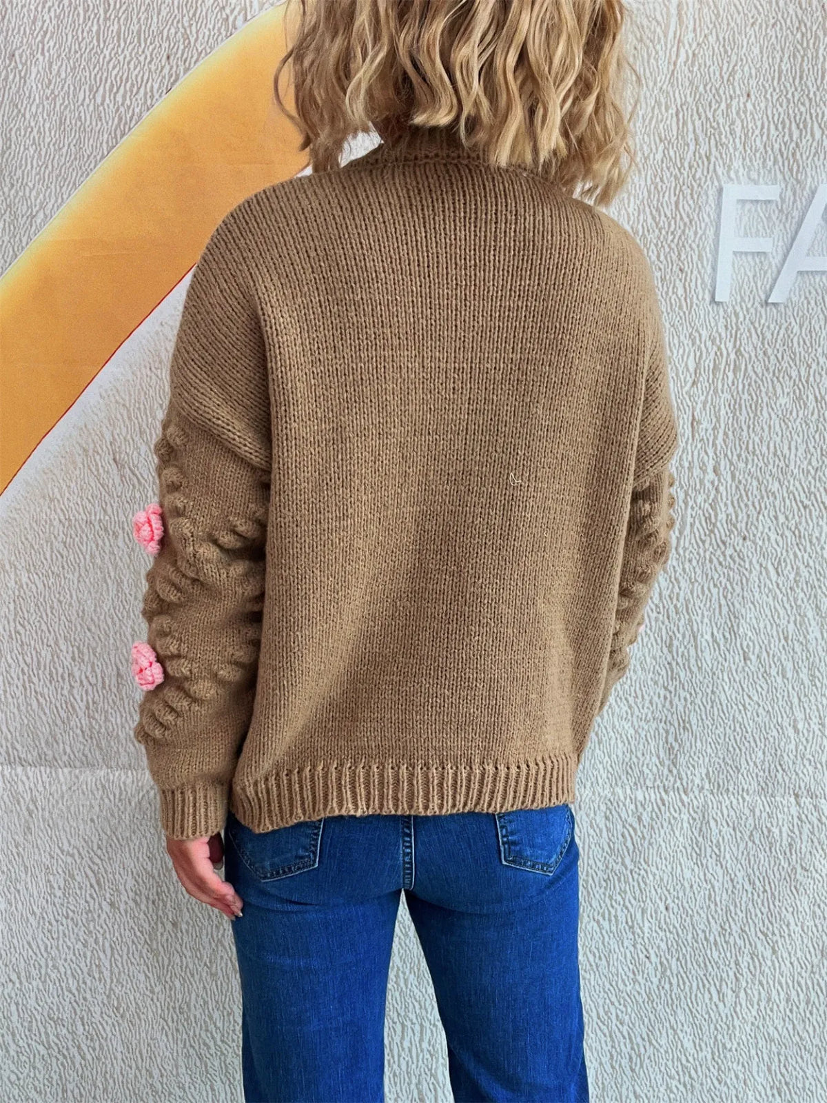 Ina cardigan med blomdetaljer
