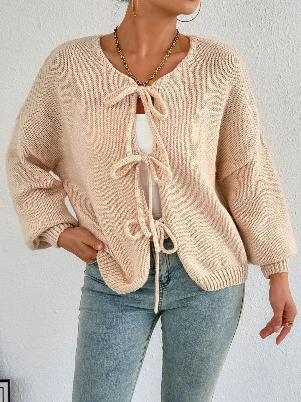 Kinga cardigan med rosett, aprikos