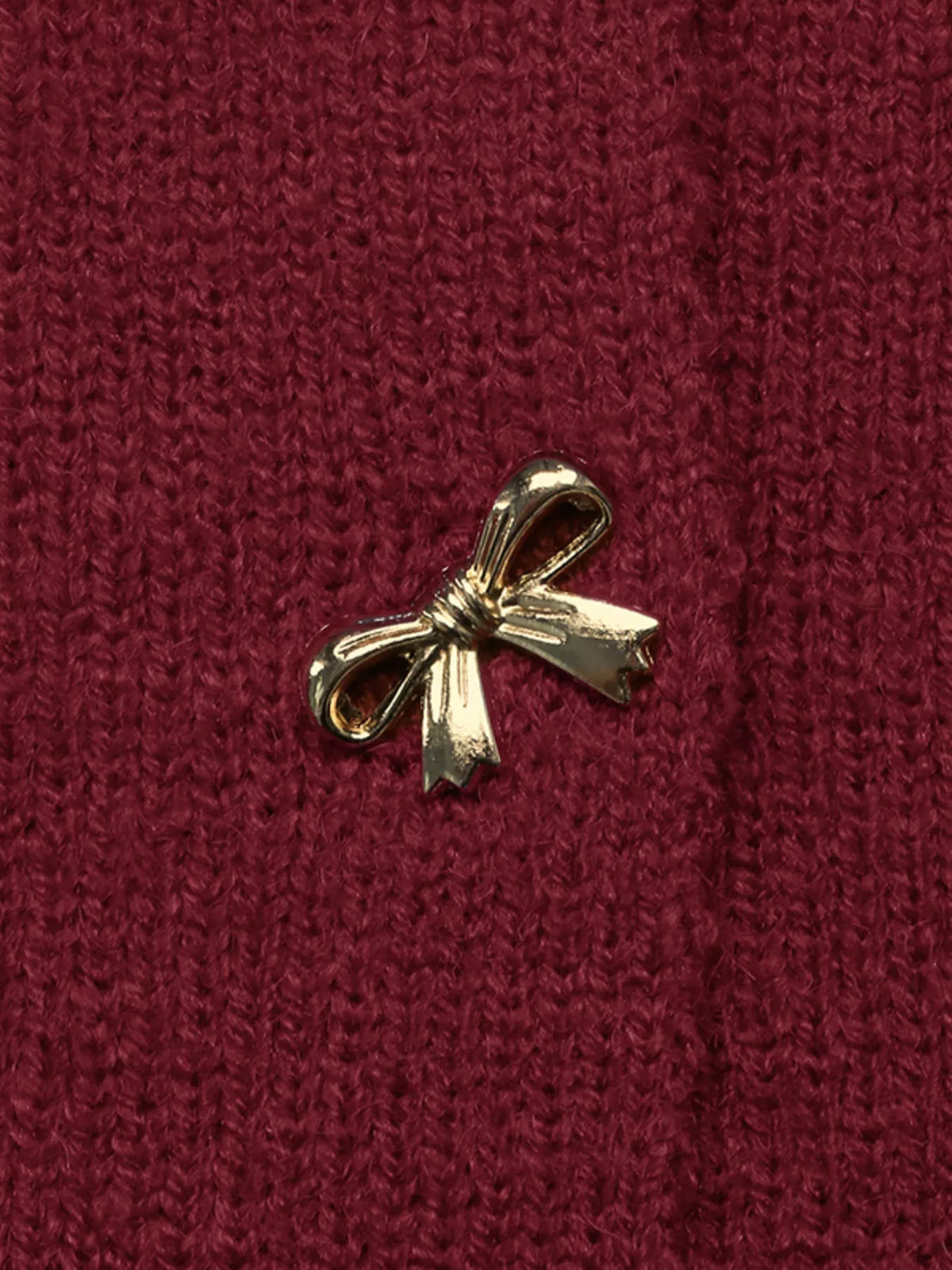 Ottilia cardigan med rosett