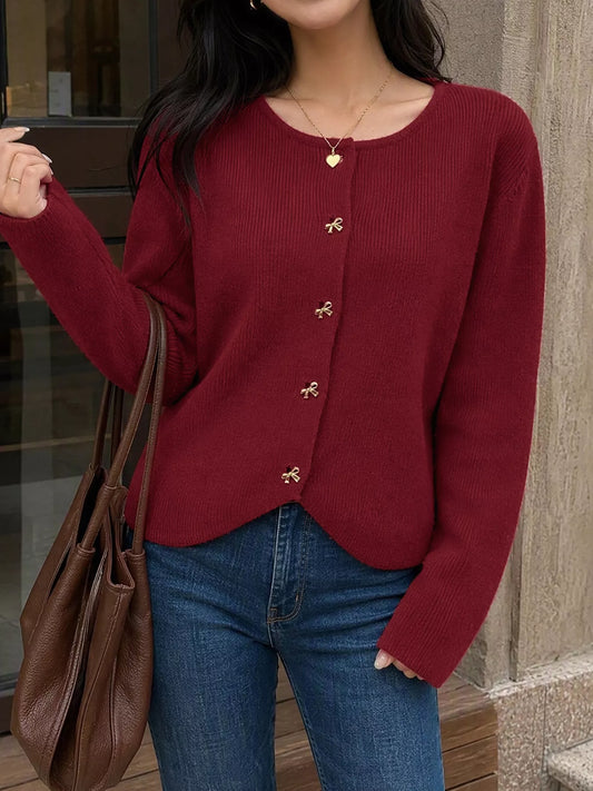 Ottilia cardigan med rosett
