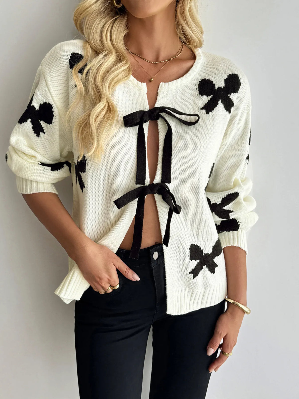 Rania cardigan med rosetter