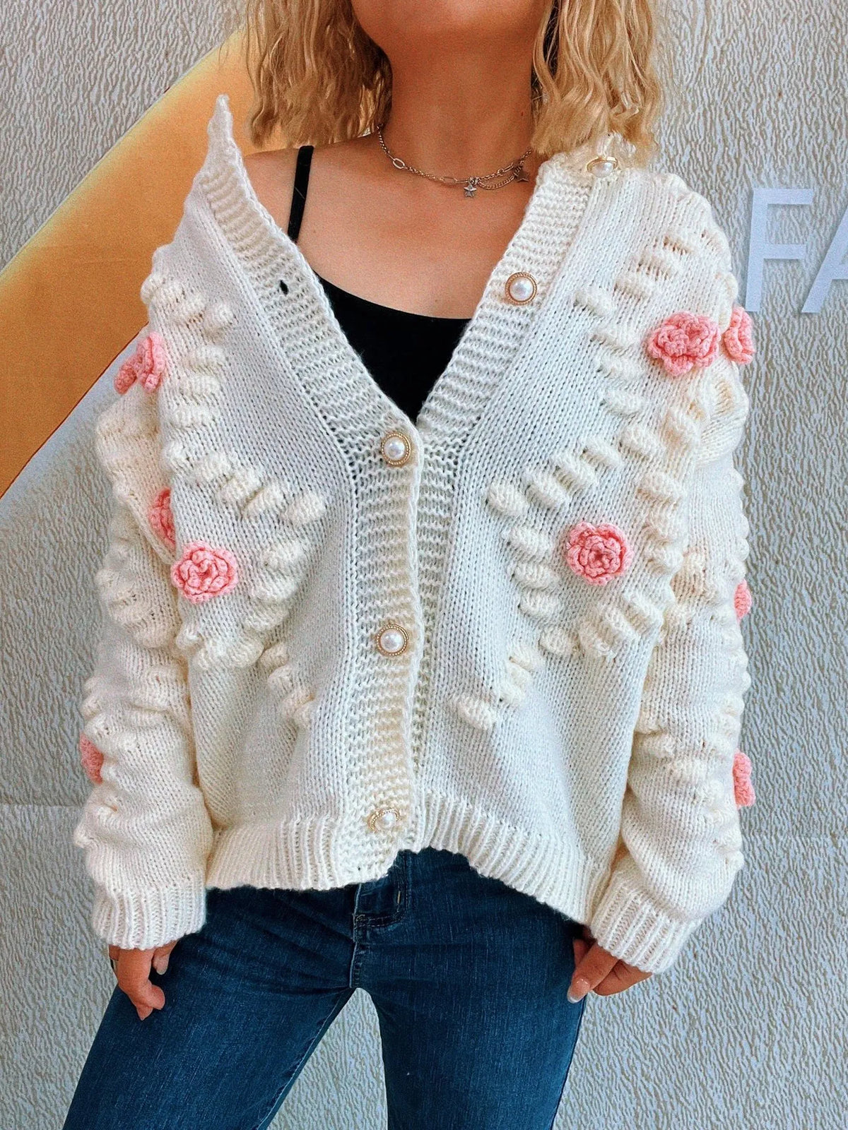 Ina cardigan med blomdetaljer