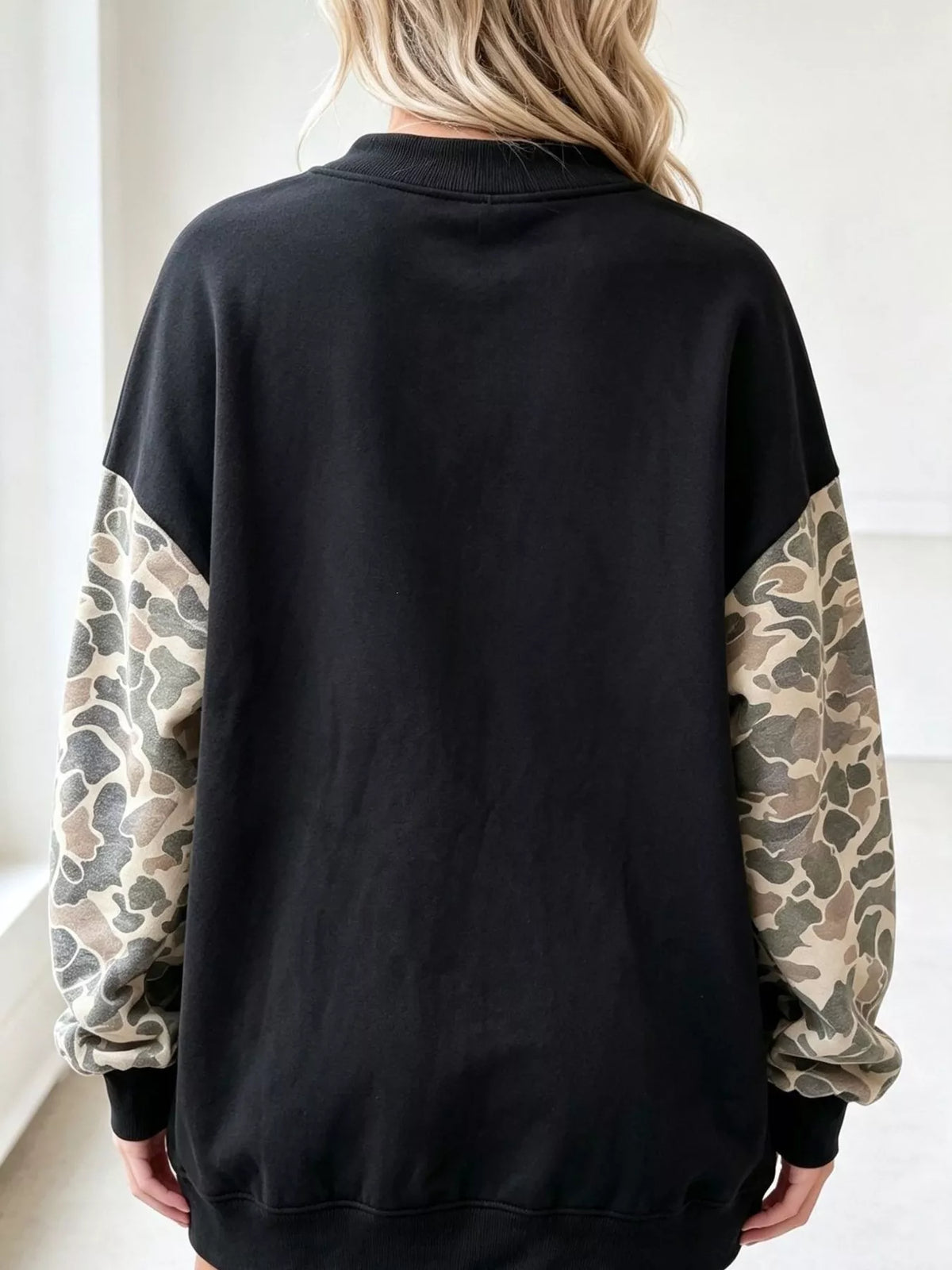 Arvida kamouflagemönstrad sweatshirt