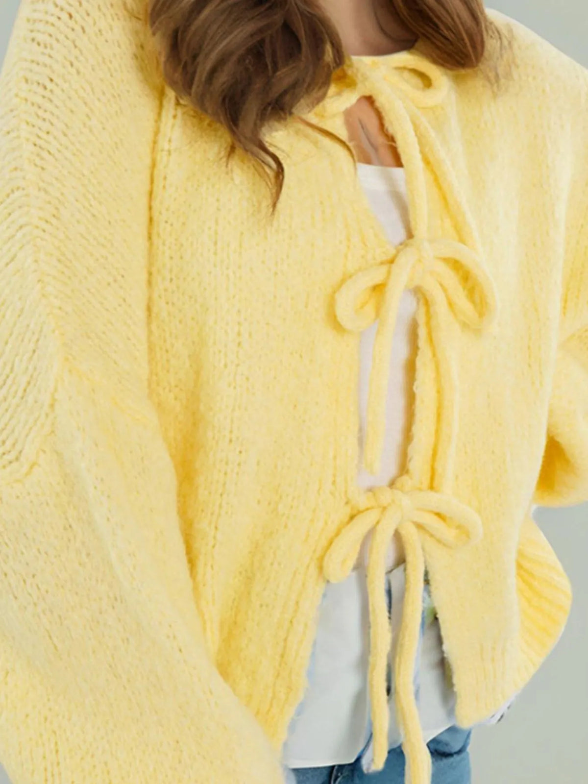 Kinga cardigan med rosett