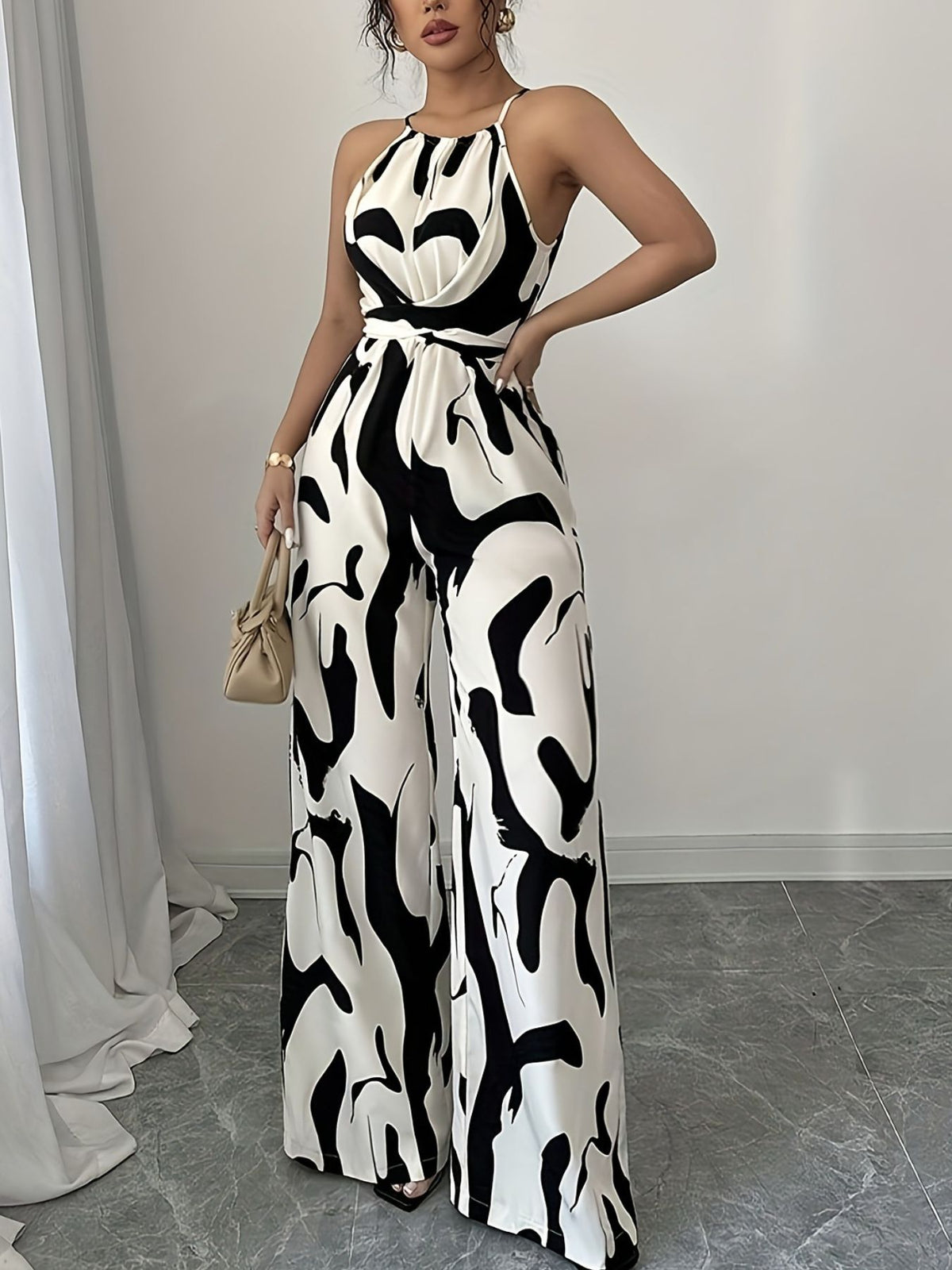 Brigitte jumpsuit med abstrakt tryck