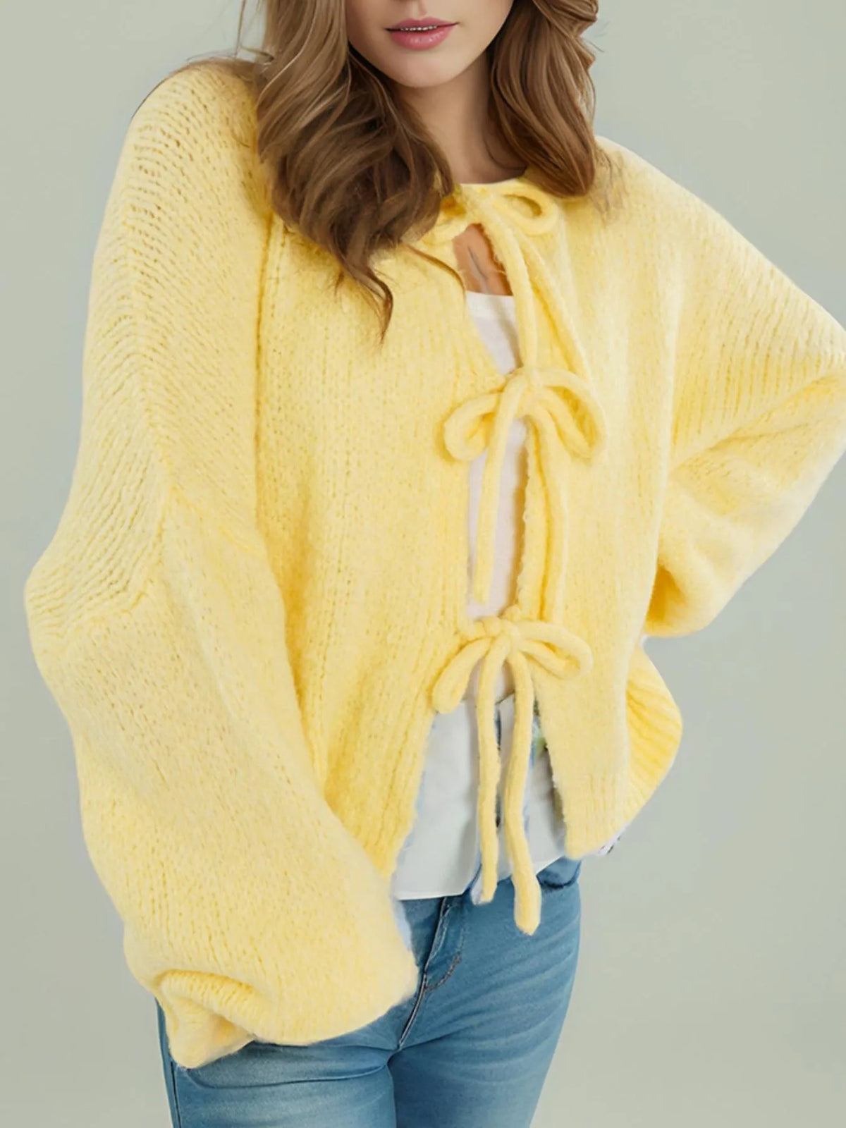 Kinga cardigan med rosett