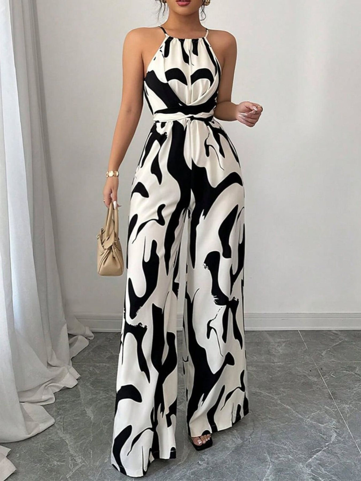 Damaris jumpsuit med abstrakt tryck