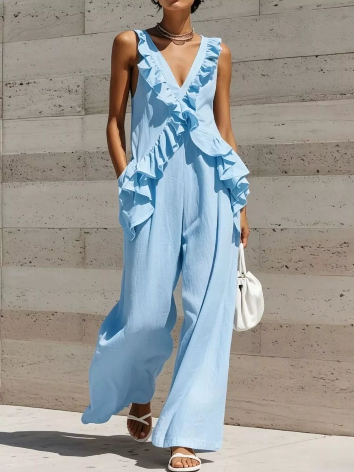 Calliope jumpsuit med volanger, ljusblå