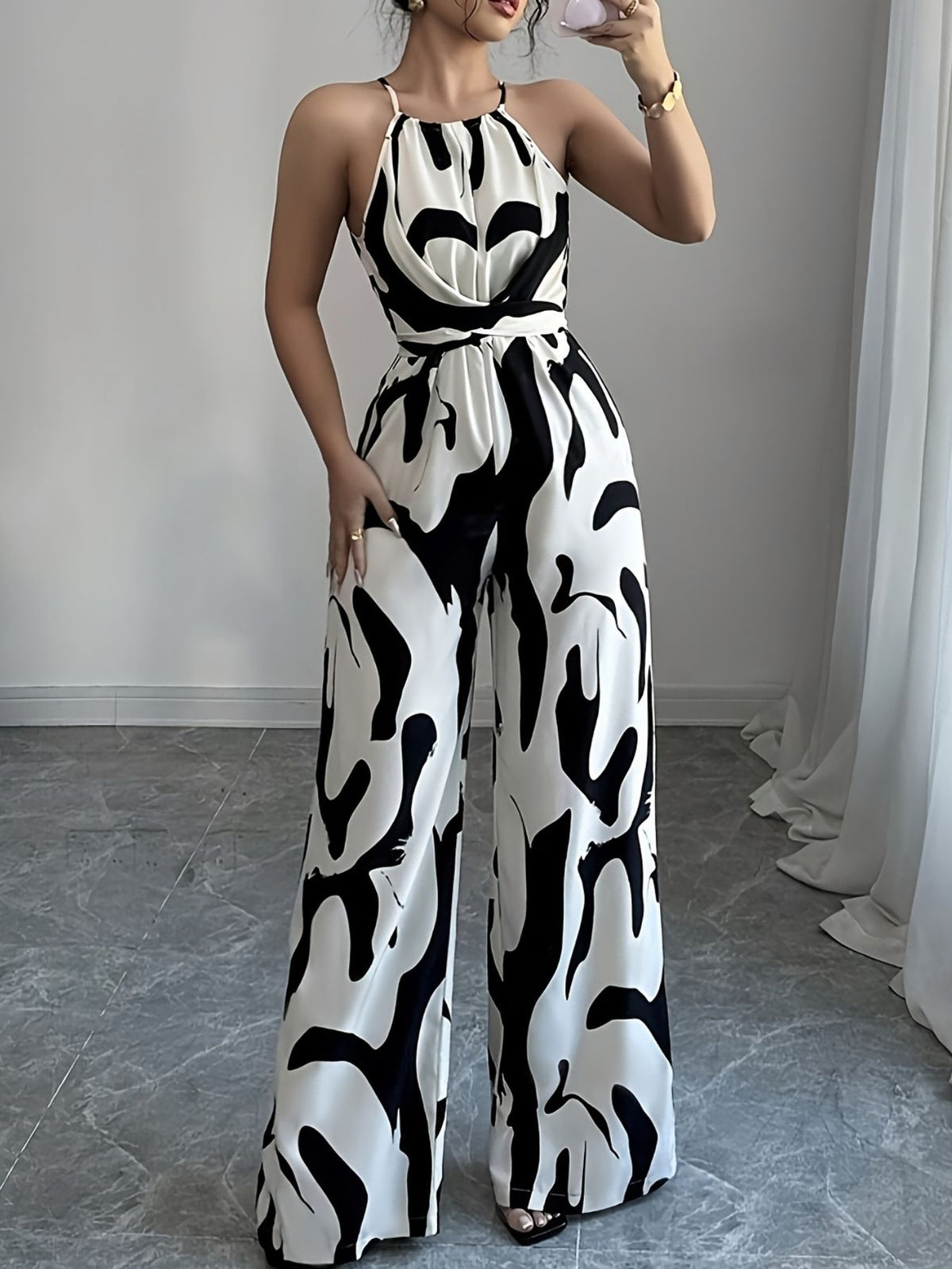 Brigitte jumpsuit med abstrakt tryck, svart
