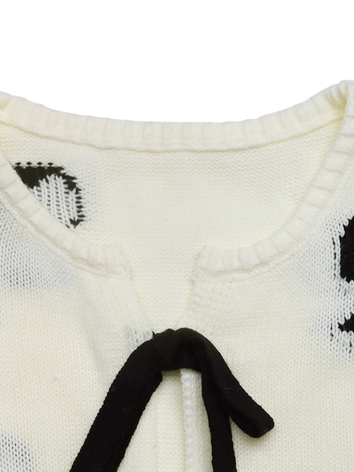 Rania cardigan med rosetter