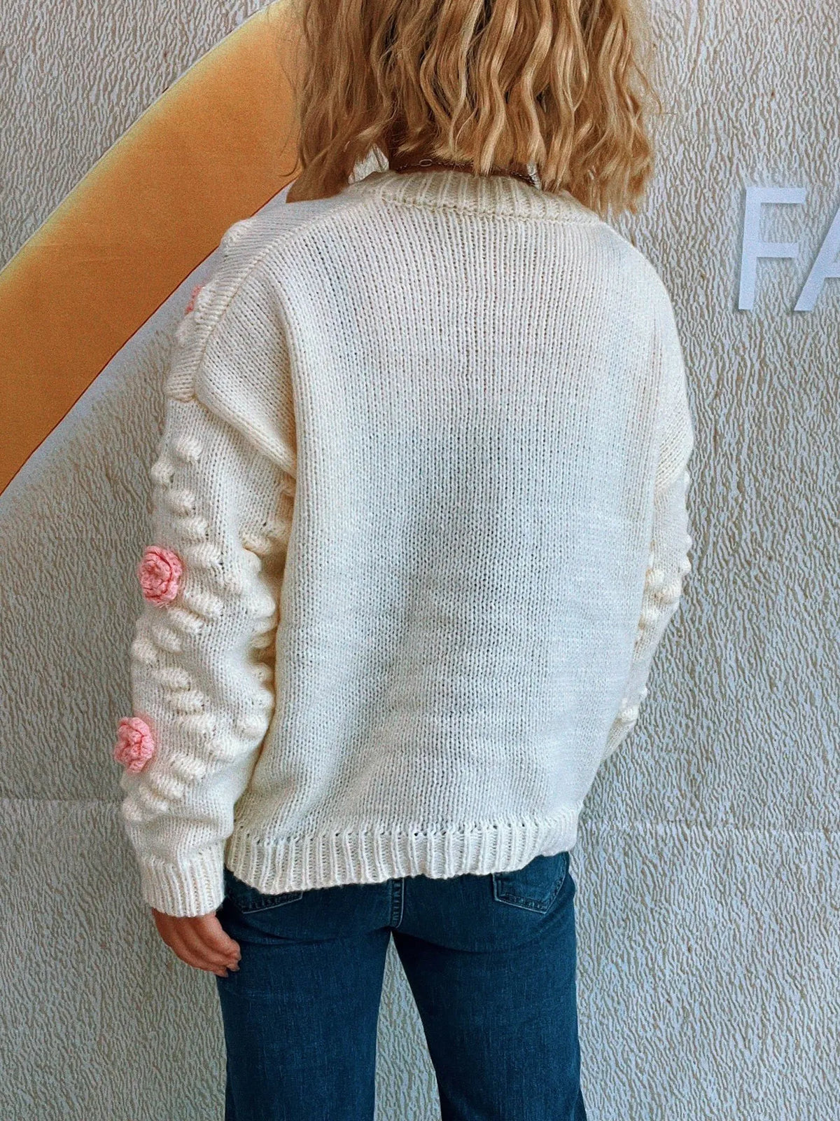 Ina cardigan med blomdetaljer