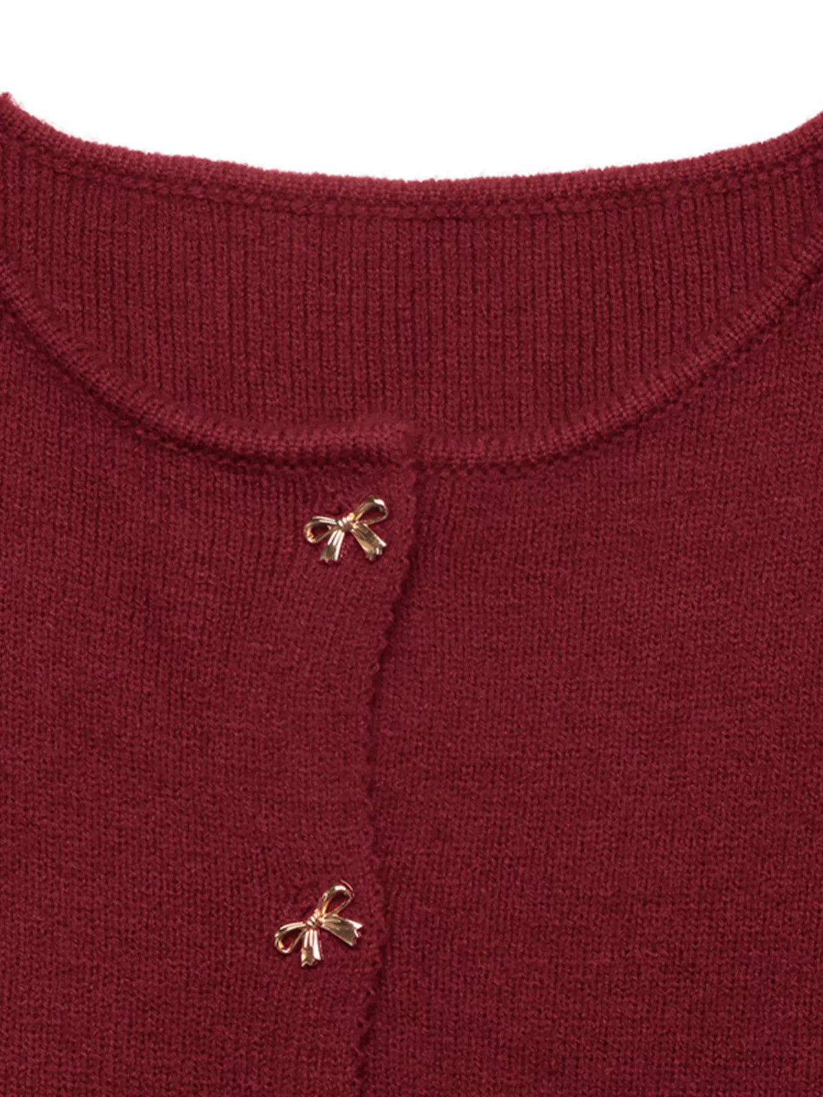 Ottilia cardigan med rosett