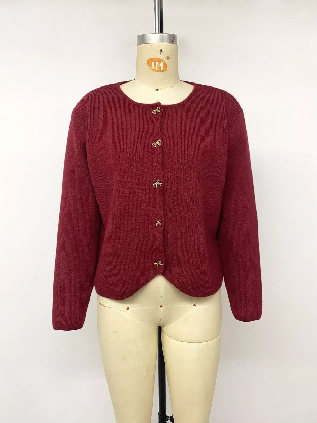 Ottilia cardigan med rosett