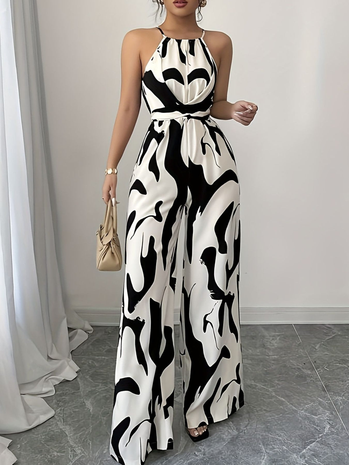 Brigitte jumpsuit med abstrakt tryck
