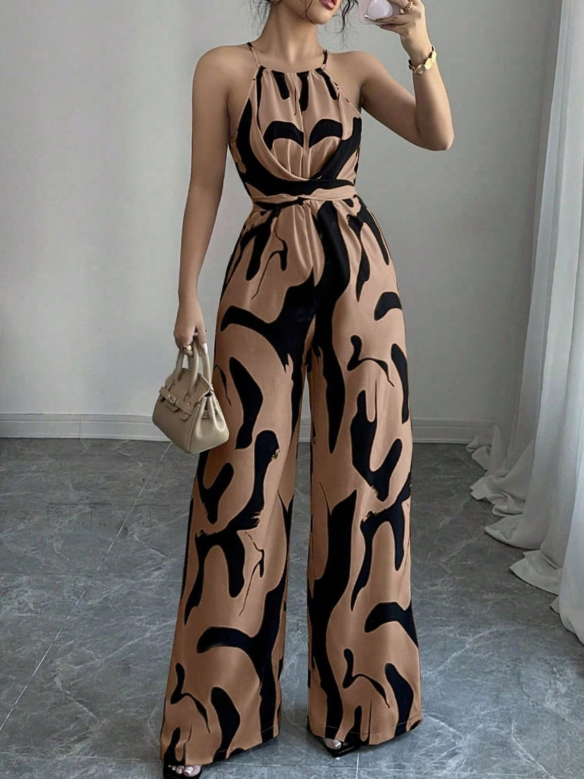 Brigitte jumpsuit med abstrakt tryck